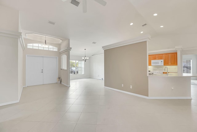 3601 SW Europe St, Port Saint Lucie, FL 34953 - foyer entrance featuring a chandelier, a ceiling fan, light tile patterned floors, recessed lighting, and high vaulted ceiling