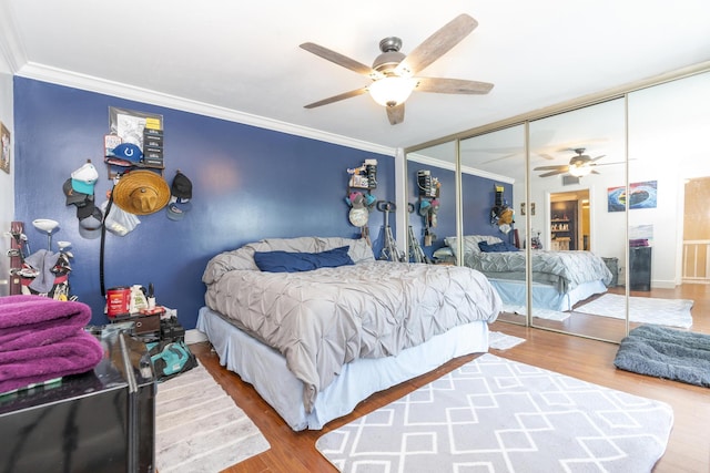 2140 White Pine Cir Unit A, Greenacres, FL 33415 - bedroom featuring crown molding, a closet, wood finished floors, and ceiling fan