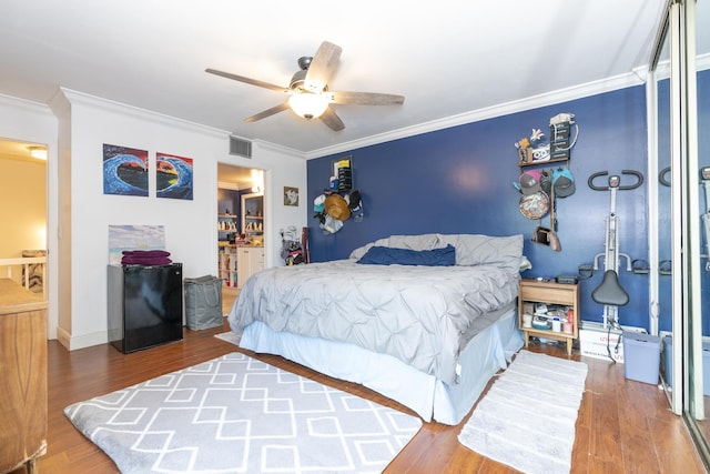 2140 White Pine Cir Unit A, Greenacres, FL 33415 - bedroom featuring wood finished floors, crown molding, ensuite bathroom, and ceiling fan