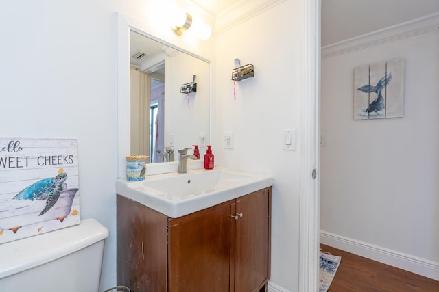 2140 White Pine Cir Unit A, Greenacres, FL 33415 - bathroom with crown molding, vanity, and wood finished floors