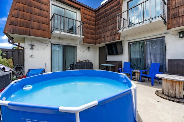 2140 White Pine Cir Unit A, Greenacres, FL 33415 - patio / terrace featuring a hot tub and a patio