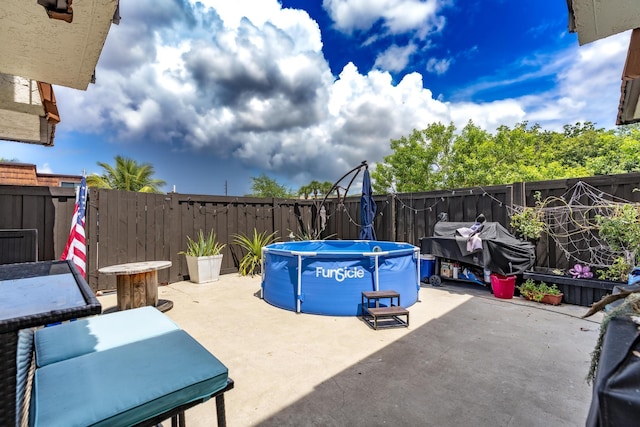 2140 White Pine Cir Unit A, Greenacres, FL 33415 - fenced backyard featuring a patio area