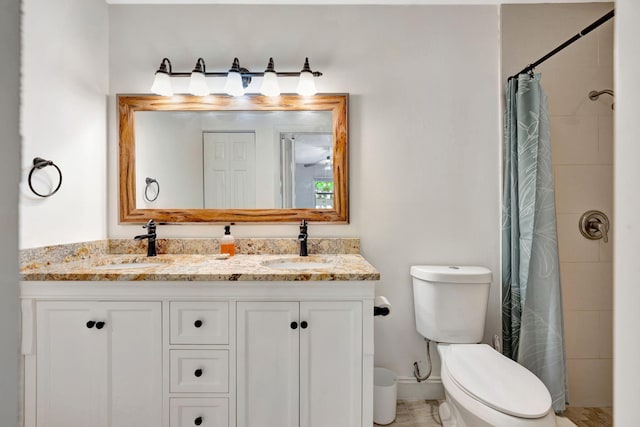 5914 SE Mitzi Ln, Stuart, FL 34997 - full bathroom with double vanity and a tile shower