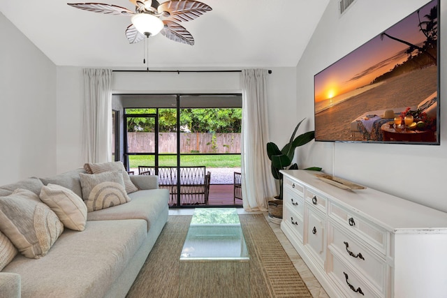 5914 SE Mitzi Ln, Stuart, FL 34997 - living area featuring ceiling fan and lofted ceiling