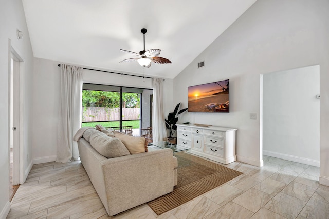 5914 SE Mitzi Ln, Stuart, FL 34997 - living room with ceiling fan and high vaulted ceiling