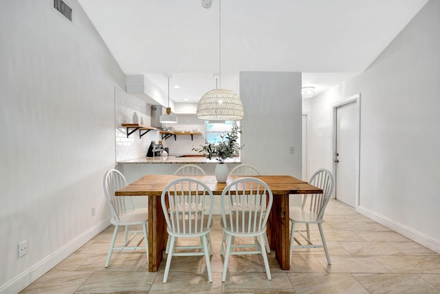 5914 SE Mitzi Ln, Stuart, FL 34997 - dining space featuring recessed lighting and baseboards