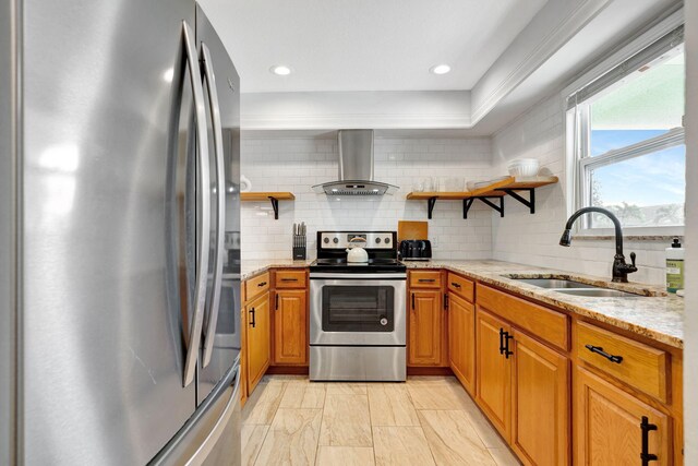 5914 SE Mitzi Ln, Stuart, FL 34997 - kitchen featuring appliances with stainless steel finishes, island exhaust hood, open shelves, light stone counters, and recessed lighting