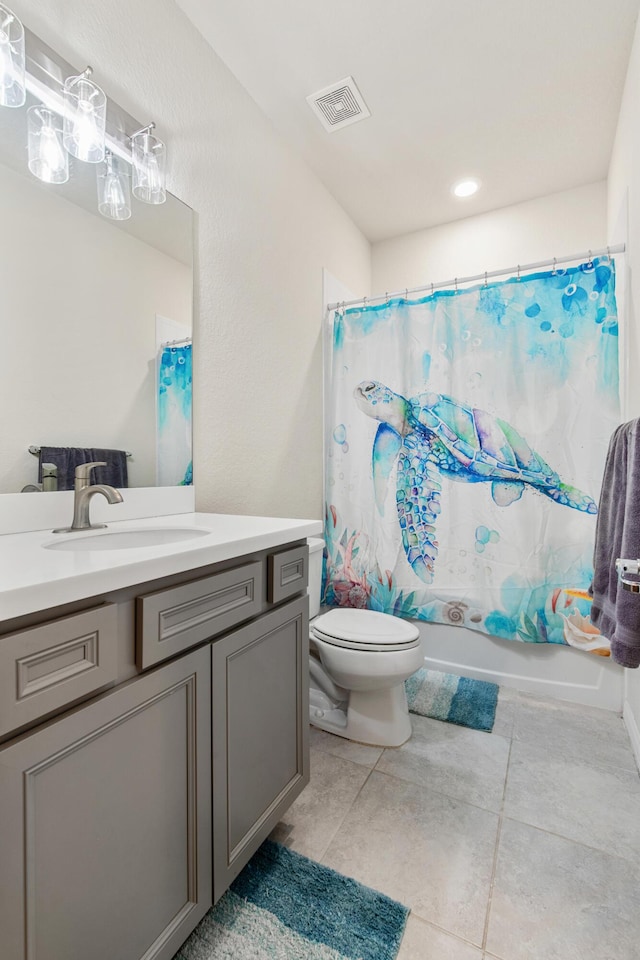 2418 Post St, Palm Springs, FL 33406 - full bathroom with vanity, tile patterned floors, and shower / bath combo with shower curtain