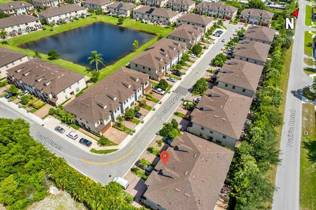 2418 Post St, Palm Springs, FL 33406 - aerial view of residential area with a large body of water