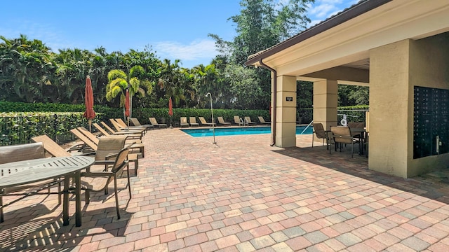 2418 Post St, Palm Springs, FL 33406 - community pool featuring a patio area