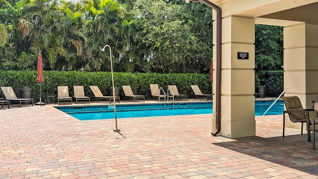 2418 Post St, Palm Springs, FL 33406 - community pool featuring a patio area