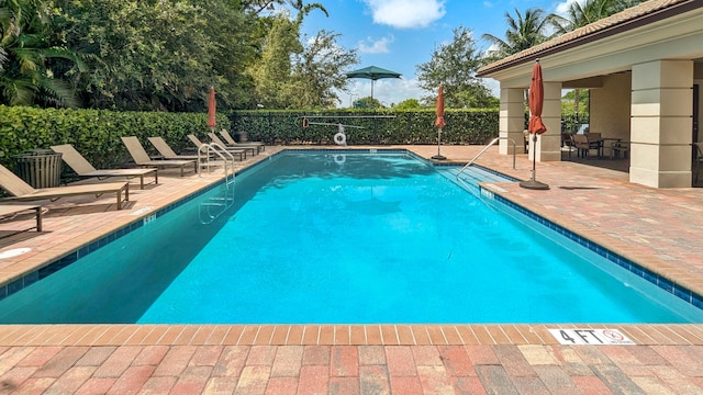 2418 Post St, Palm Springs, FL 33406 - community pool with a patio area