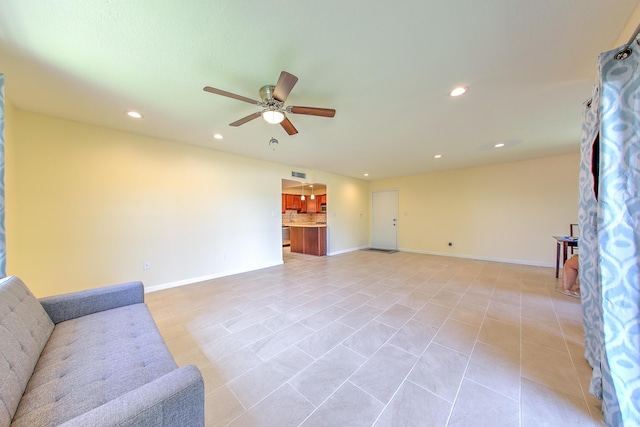 2050 Oleander Blvd Unit 5301, Fort Pierce, FL 34950 - unfurnished living room featuring a ceiling fan, recessed lighting, and light tile patterned flooring