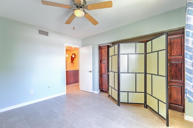 2050 Oleander Blvd Unit 5301, Fort Pierce, FL 34950 - unfurnished bedroom featuring baseboards and light tile patterned flooring