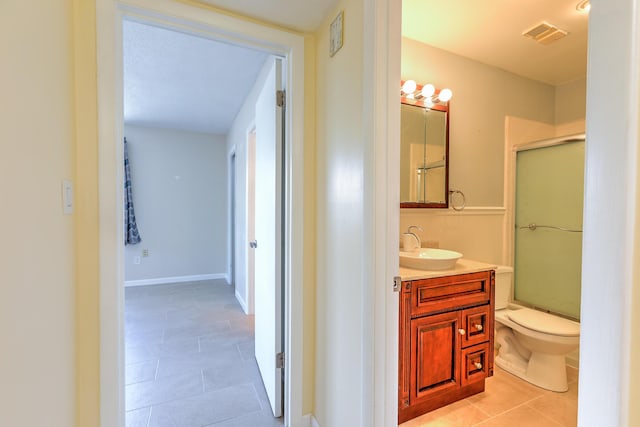 2050 Oleander Blvd Unit 5301, Fort Pierce, FL 34950 - bathroom with tile patterned floors, vanity, and a shower with shower door