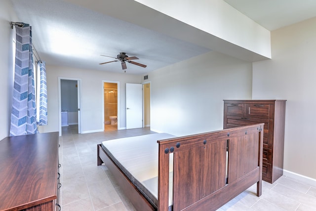 2050 Oleander Blvd Unit 5301, Fort Pierce, FL 34950 - bedroom featuring light tile patterned flooring, ensuite bath, and ceiling fan
