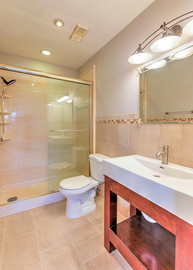 2050 Oleander Blvd Unit 5301, Fort Pierce, FL 34950 - full bath featuring a stall shower, vanity, tile walls, tile patterned floors, and recessed lighting