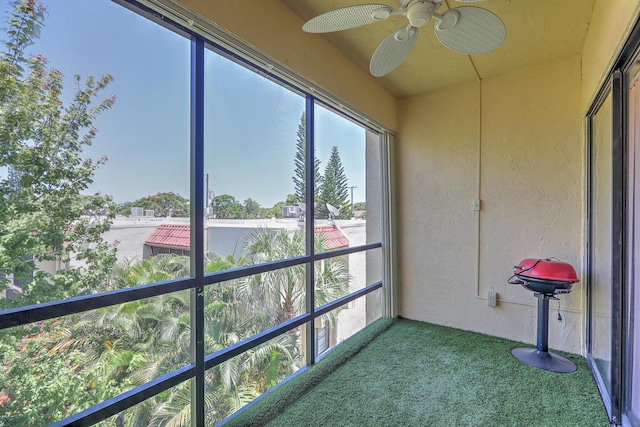 2050 Oleander Blvd Unit 5301, Fort Pierce, FL 34950 - unfurnished sunroom featuring a textured wall and carpet flooring