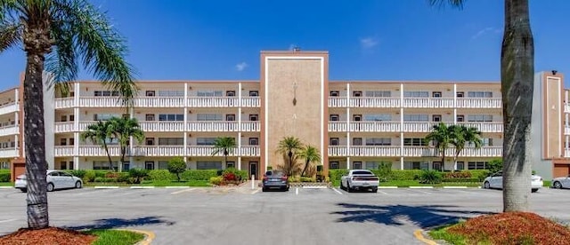4074 Cornwall D 4074, Boca Raton, FL 33434 - view of apartment building / complex featuring uncovered parking