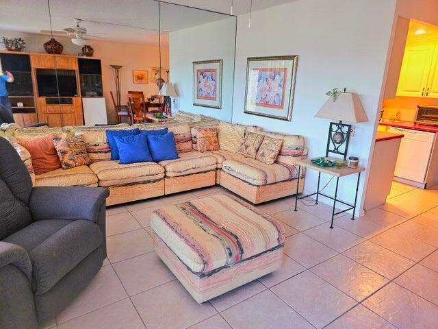 4074 Cornwall D 4074, Boca Raton, FL 33434 - living area featuring a ceiling fan and light tile patterned flooring