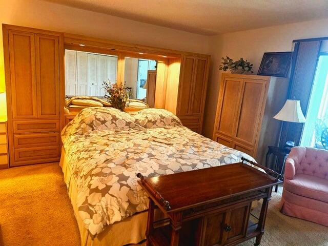 4074 Cornwall D 4074, Boca Raton, FL 33434 - bedroom featuring light colored carpet