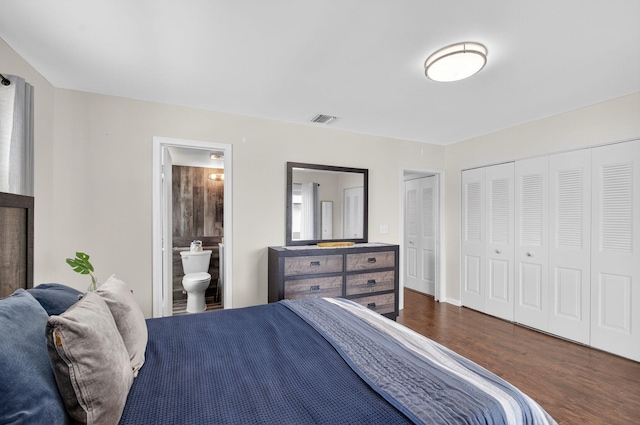 363 Sheffield O, West Palm Beach, FL 33417 - bedroom featuring dark wood-type flooring and connected bathroom