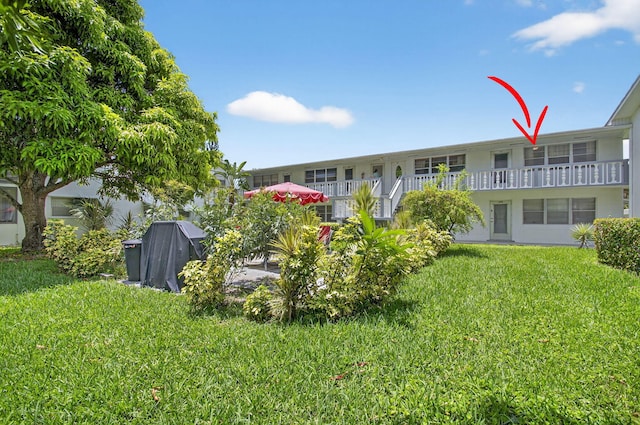 363 Sheffield O, West Palm Beach, FL 33417 - view of grassy yard