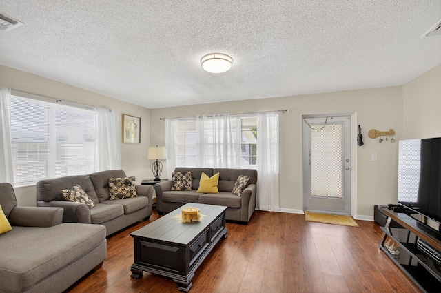 363 Sheffield O, West Palm Beach, FL 33417 - living area featuring a textured ceiling and dark wood-style floors