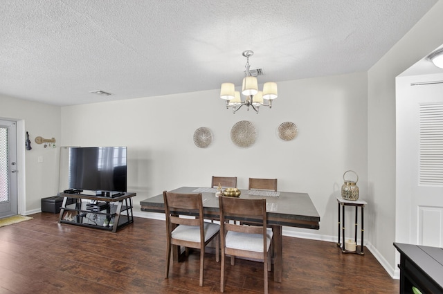363 Sheffield O, West Palm Beach, FL 33417 - dining room featuring a chandelier, wood finished floors, and a textured ceiling