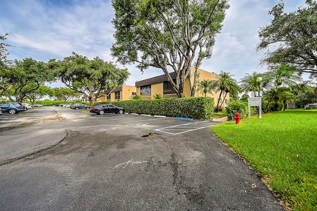 15126 Ashland St Unit 250, Delray Beach, FL 33484 - view of front of home with uncovered parking and stucco siding