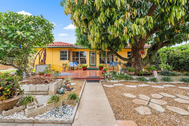 1802 Lake Osborne Dr, Lake Worth Beach, FL 33461 - view of front of home featuring stucco siding, a deck, and a tiled roof