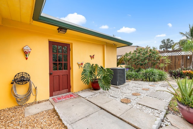 1802 Lake Osborne Dr, Lake Worth Beach, FL 33461 - property entrance with stucco siding and a patio