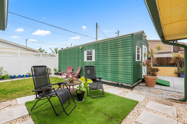 1802 Lake Osborne Dr, Lake Worth Beach, FL 33461 - fenced backyard featuring a patio and an outdoor structure