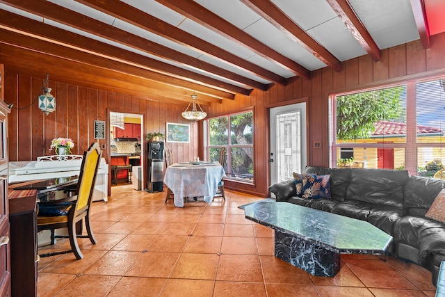 1802 Lake Osborne Dr, Lake Worth Beach, FL 33461 - living room with wooden walls, beam ceiling, and light tile patterned flooring