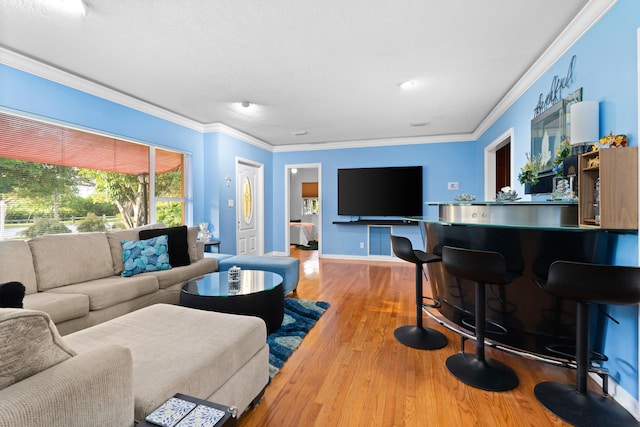 1802 Lake Osborne Dr, Lake Worth Beach, FL 33461 - living room featuring wood finished floors, crown molding, and bar area