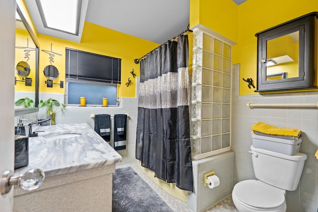 1802 Lake Osborne Dr, Lake Worth Beach, FL 33461 - bathroom featuring tile walls, wainscoting, tile patterned floors, vanity, and curtained shower