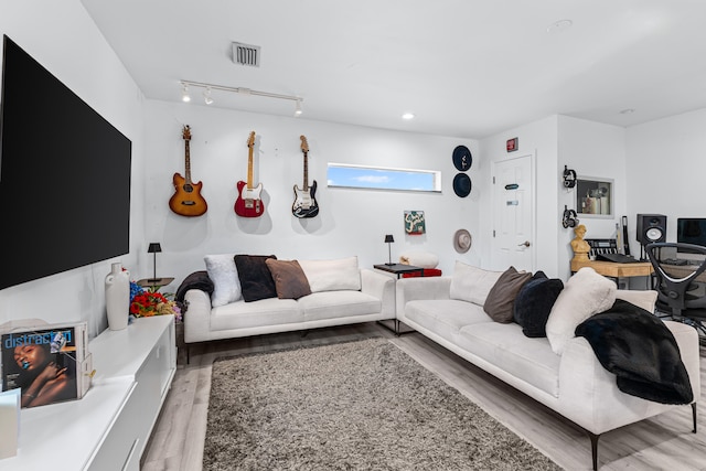 1802 Lake Osborne Dr, Lake Worth Beach, FL 33461 - living area with light wood-type flooring, rail lighting, an office area, and recessed lighting