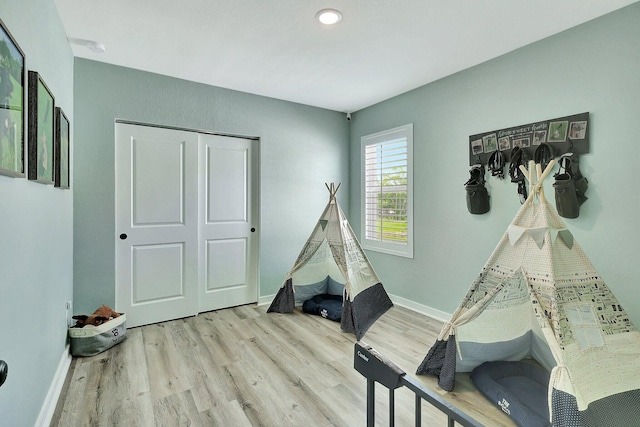 650 NE Waters Edge Ln, Port Saint Lucie, FL 34983 - recreation room with wood finished floors and recessed lighting