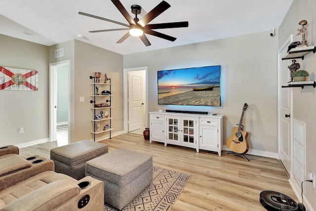650 NE Waters Edge Ln, Port Saint Lucie, FL 34983 - living area featuring ceiling fan and light wood-type flooring