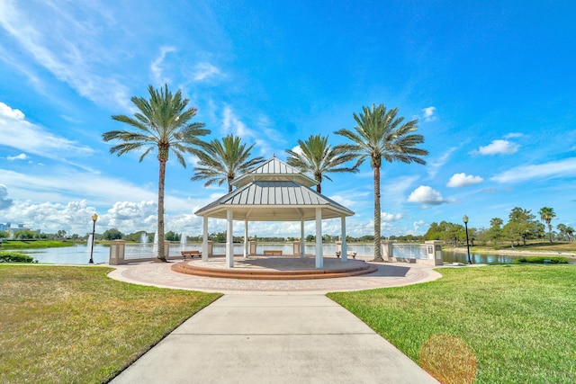650 NE Waters Edge Ln, Port Saint Lucie, FL 34983 - view of community with a gazebo, a yard, and a water view
