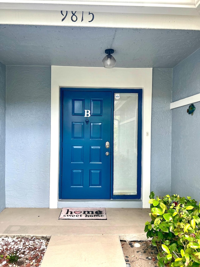 9815 Watermill Cir Unit B, Boynton Beach, FL 33437 - property entrance featuring stucco siding