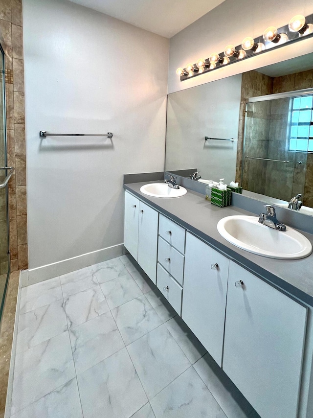 9815 Watermill Cir Unit B, Boynton Beach, FL 33437 - bathroom with double vanity, a shower stall, and marble finish flooring