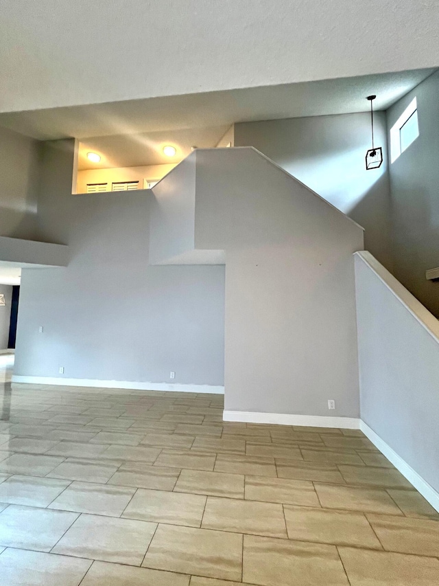 9815 Watermill Cir Unit B, Boynton Beach, FL 33437 - unfurnished living room featuring baseboards