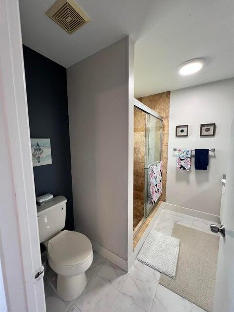 9815 Watermill Cir Unit B, Boynton Beach, FL 33437 - bathroom with marble finish floors and a shower stall