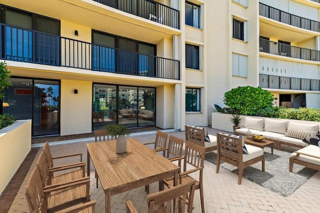 300 Ocean Trail Way Unit 102, Jupiter, FL 33477 - view of patio / terrace with outdoor lounge area