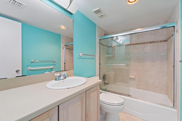 300 Ocean Trail Way Unit 102, Jupiter, FL 33477 - bathroom featuring vanity, combined bath / shower with glass door, tile patterned flooring, and recessed lighting