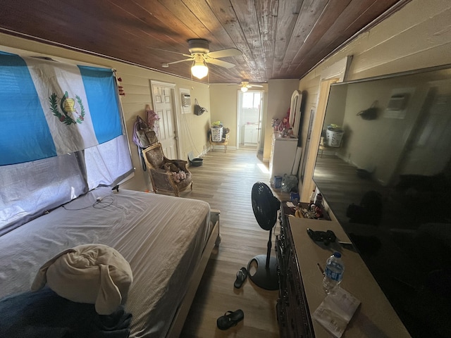 628 W 7th St, Riviera Beach, FL 33404 - bedroom with wood ceiling, wood finished floors, and a ceiling fan