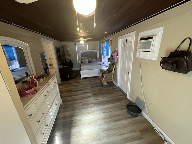 628 W 7th St, Riviera Beach, FL 33404 - bedroom with wood finished floors, wooden ceiling, and a wall mounted air conditioner