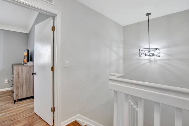 8730 SW 21st St, Miramar, FL 33025 - hall with light wood-style flooring and an upstairs landing