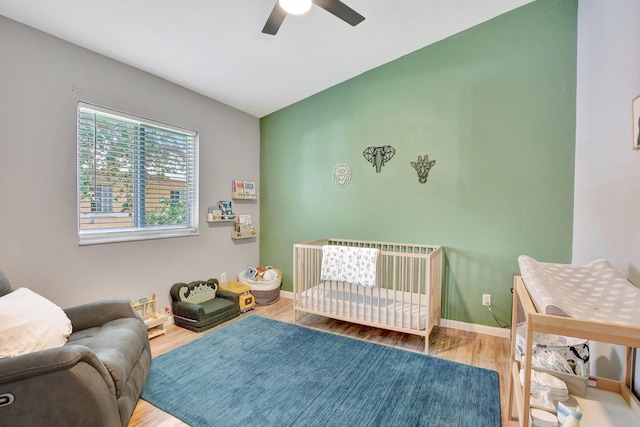 8730 SW 21st St, Miramar, FL 33025 - bedroom with wood finished floors, ceiling fan, and vaulted ceiling